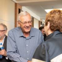 Lynn M. Blue greeting a guest at the Lynn M. Blue Connection Naming Ceremony